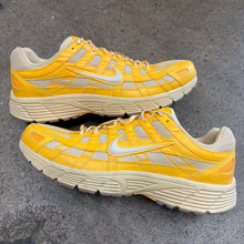 Load image into Gallery viewer, Nike University Gold P-6000s Size 14
