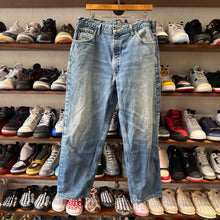 Load image into Gallery viewer, Carhartt Plaid Insulated Jeans Size 38x30
